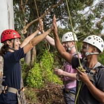 Outward Bound students tie in and high five