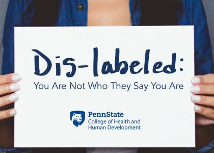 A woman holding a sign. Dis-labeled: You are not who they say you are. Penn State College of Health and Human Development logo