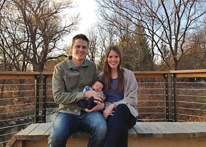 Derek Hartman with his wife and son.