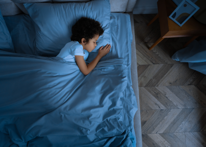 Child sleeping in bed