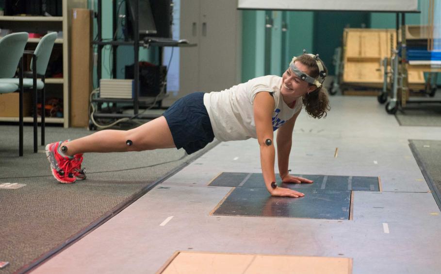 Student with sensors in the Kinesiology laboratory. 