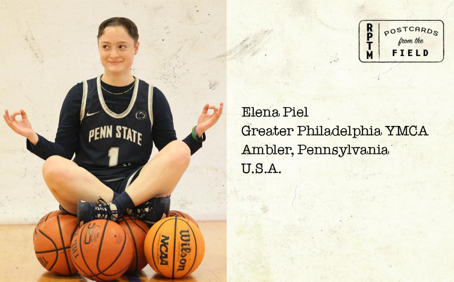 Elena sitting on basketballs in a yoga pose