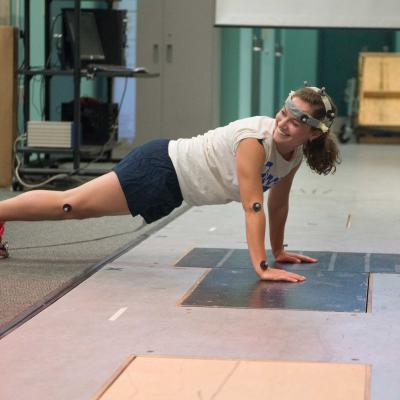 Student with sensors in the Kinesiology laboratory.