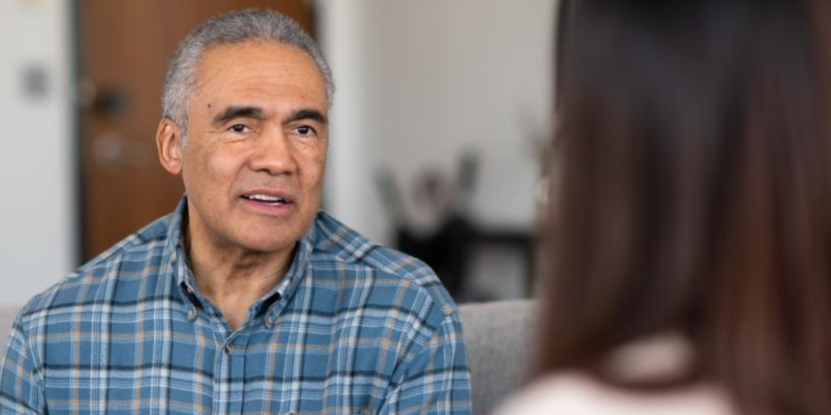 A person with aphasia receives mental health counseling